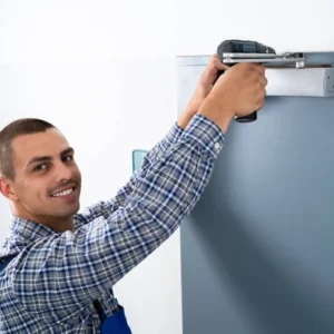 Wall-mounted door closer installation